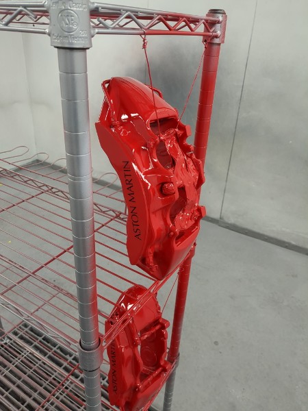 Aston Martin brake calipers freshly painted red