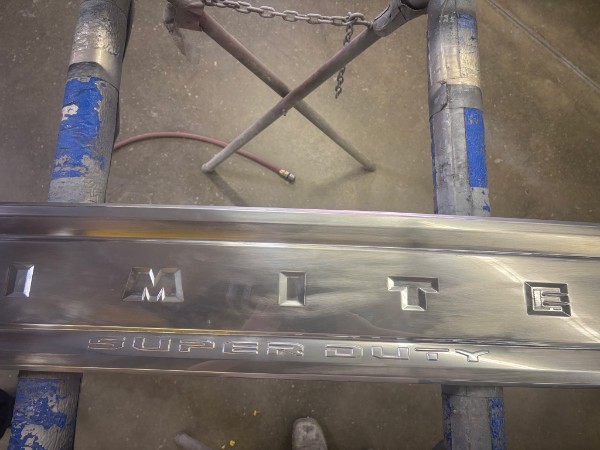 Tailgate panel stripped and sanded for refinishing
